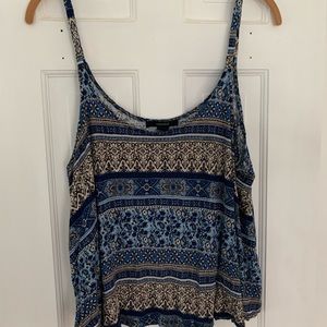 Blue patterned short flowy tank.